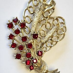 Elegant Gold and Red Brooch